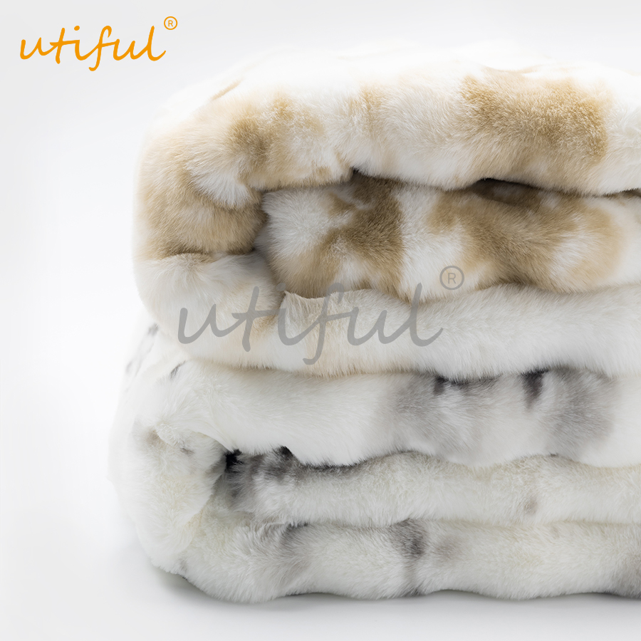 Printed faux fur throw blanket